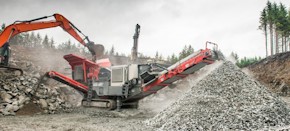 Sandvik QJ341+ Mobile jaw crusher working in a quarry